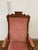 Design Plus Gallery presents a Platform Rocking Chair with Victorian Era Style + Age. The chair has a blush rose pink...