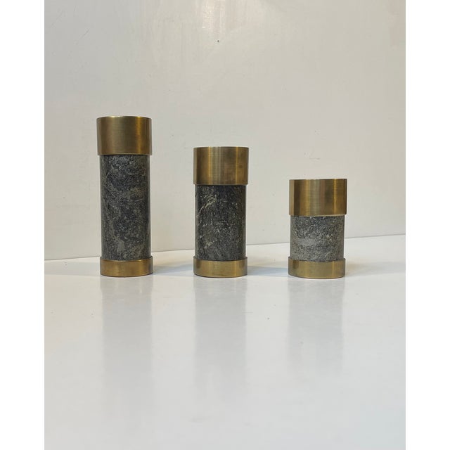 Art deco styled mid-century cylindrical candleholders for tea lights or block/church candles. Fashioned from slaps/cuts of...