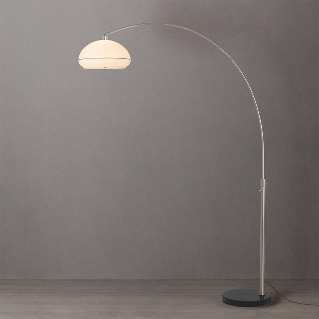The Morelli Arc Lamp is a modern lighting solution designed by Peter Morelli in 1960, featuring a sleek satin nickel steel...