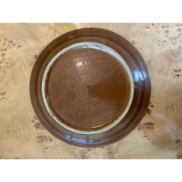 Antique Chinese Batavia stoneware bowl, Qing Dynasty, made for export to Southeast Asia. Hand-painted interior blue and...