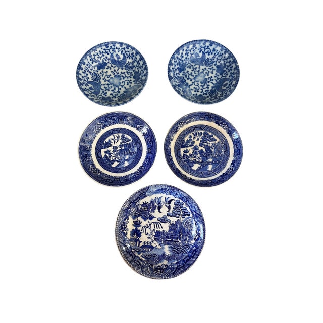 Vintage Blue and White porcelain set featuring classic Willow Pattern and Phoenix motif designs. This five-piece...