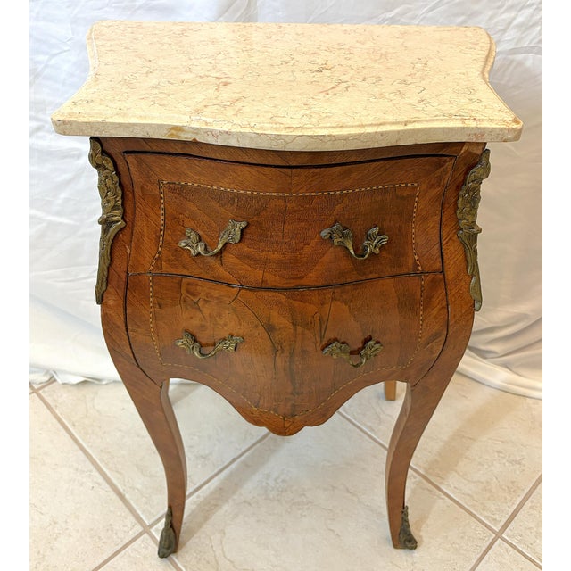 Delightful French Louis XVI style two drawer chest with marble top. This piece is very well made of solid wood with a...