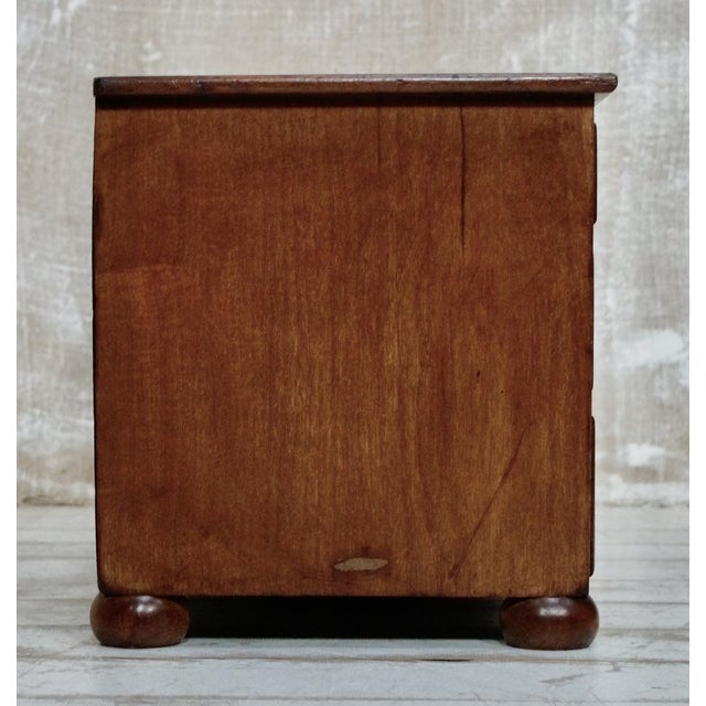 Antique Oak counter top drawers. Made from Oak, with 9 graduated drawers, retaining the original brass resessed loop...