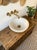 This handcrafted white marble bubble rim vessel sink is designed with a mix of vintage style and modern elegance. Made...