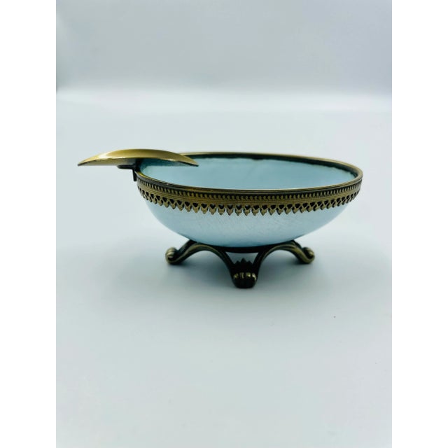This Evans Guilloche egg-shaped ash tray from the 1950’s is a RARE treasure. The Robin's Egg-color enameling is not only...