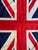 This is a late 20th century Union Jack flag. It is made from nylon. It features a classic combination of the crosses of...