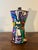A vibrant handcrafted Cuban folk art paper mache espresso pot, hand painted in an expressive palette of bold colors and...