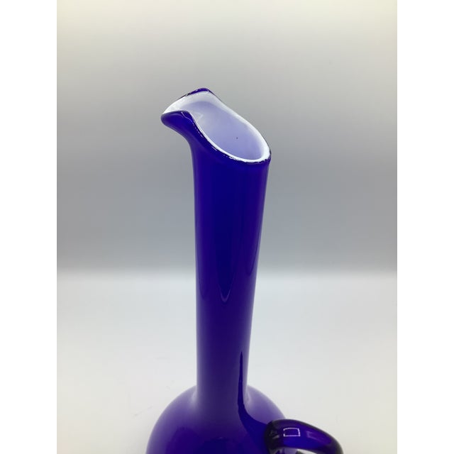 A stunning and rare set of 60s blue Carlo Moretti cased glass liquor decanter with 6 tall stemmed cordial/liquor glasses....