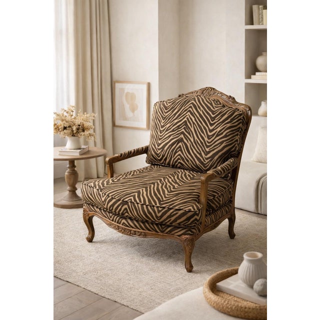 Add a touch of dramatic flair to your space with this substantial French Provincial Bergere armchair. The classic, hand-...