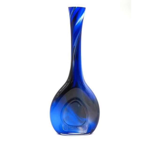 A wonderfully unique and rare vase in a lovely blue color with white and black elements. A stylish eye-catcher in the...