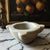 A beautifully hand-carved French white marble mortar dating to the late 19th century. Featuring a distinctive four-lobed...