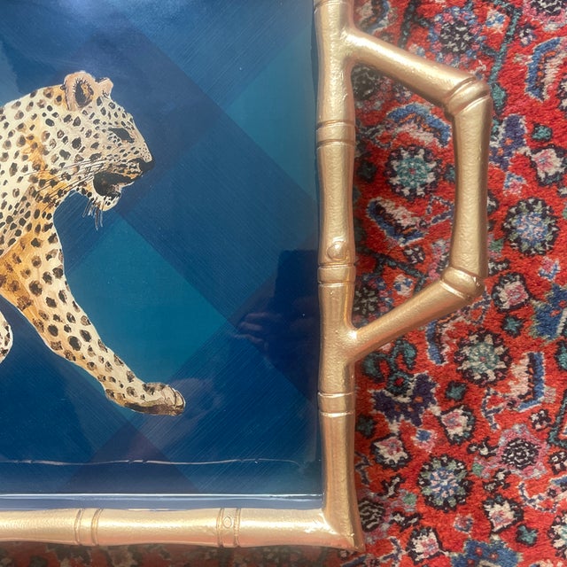 Beautiful gold, bamboo frame and handles with a Beautiful leopard and the background is checkered blue and green. Brand...