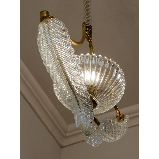 Vintage Barovier & Toso chandelier, with central brass structure embellished with two leaves and a central Murano glass...
