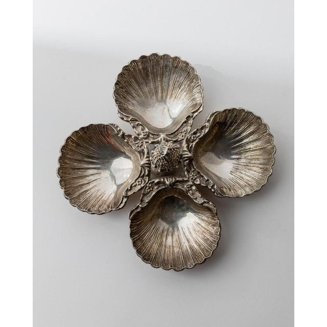 This vintage 1930s silver-plated centerpiece bowl is an exceptional Art Deco table object of remarkable craftsmanship....