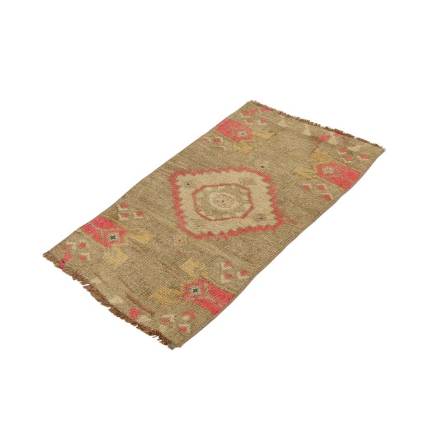 Vintage Handknotted decorative mini rug from Kars region of Turkey. Approximately 45-55 years old. In very good condition.