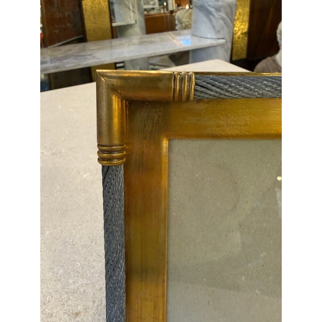 Elegant vintage Italian photo frame crafted in warm brushed brass and accented with distinctive braided steel cable...