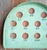 We are selling this cool primitive folk art Skee Ball game. This wood piece is painted in pistachio green color with red...