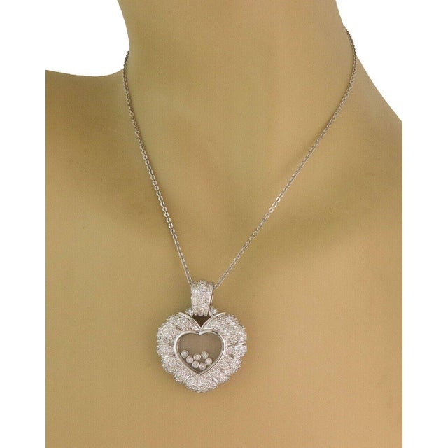This is a gorgeous large pendant with chain, crafted from 18k white gold with a polished finish. The pendant features a...
