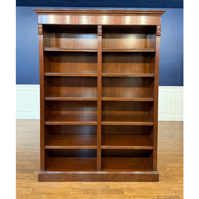 This is a Traditional Mahogany Bookcase made by Leighton Hall Furniture. It features mahogany solids and veneers, fluted...
