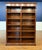 This is a Traditional Mahogany Bookcase made by Leighton Hall Furniture. It features mahogany solids and veneers, fluted...