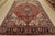 An authentic vintage traditional Heriz rug hand-knotted with fine wool and natural dyes. This oriental rug features a...