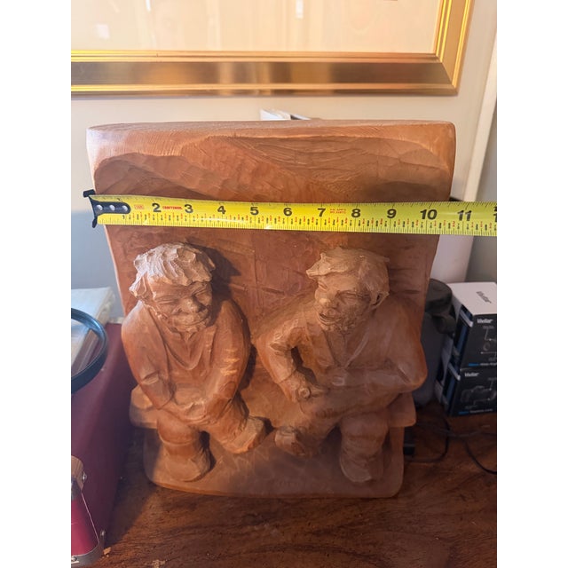 Conversation caught in time is a one piece of wood sculpture. The artist T.J. Korpi is a Finnish sculptor 1910-1959. The...