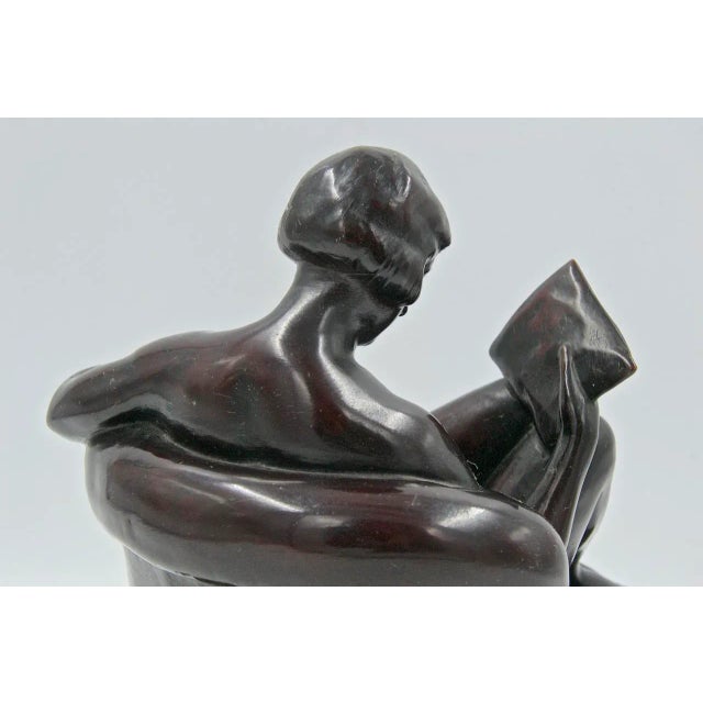 Signed on the back and label under the black wood base. This piece has an attribution mark, I am sure that it is...