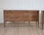 A refined and architecturally balanced Italian mid-19th century neoclassical sideboard, crafted in carved wood and...