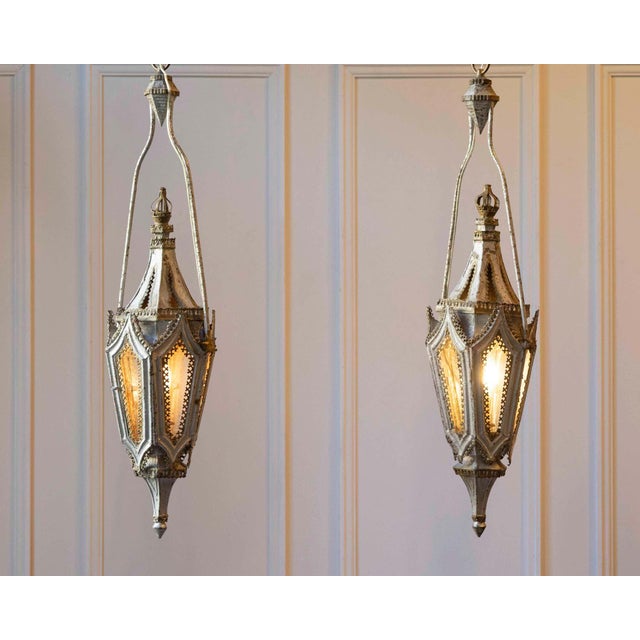 English Gothic Revival painted iron single-light lanterns from the 19th century, priced and sold per pair. Two pairs are...