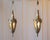 English Gothic Revival painted iron single-light lanterns from the 19th century, priced and sold per pair. Two pairs are...