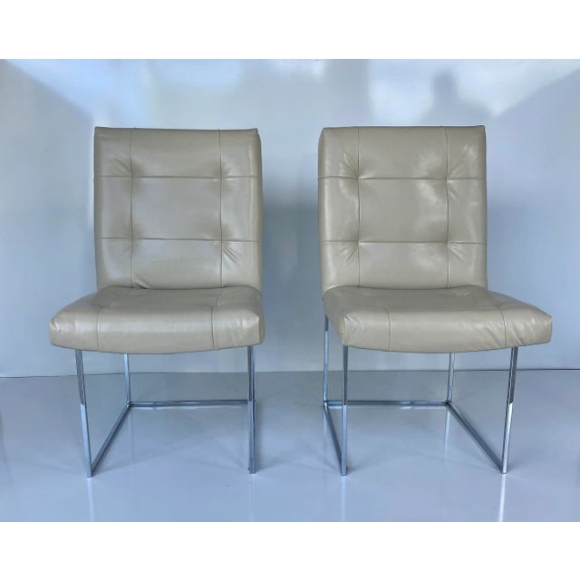 A set of four (4) vintage midcentury iconic armless thin line dining chairs by Milo Baughman for Thayer Coggin. Tufted...