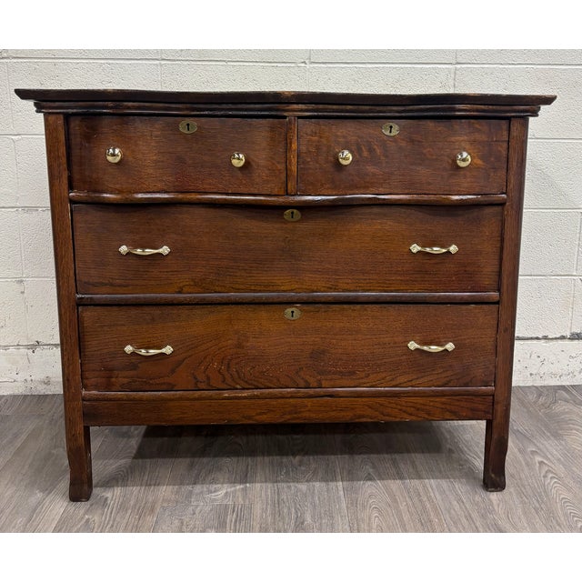 This is a gorgeous antique 19th century Victorian Eastlake dresser with mirror. Wood appears to be walnut. It features...