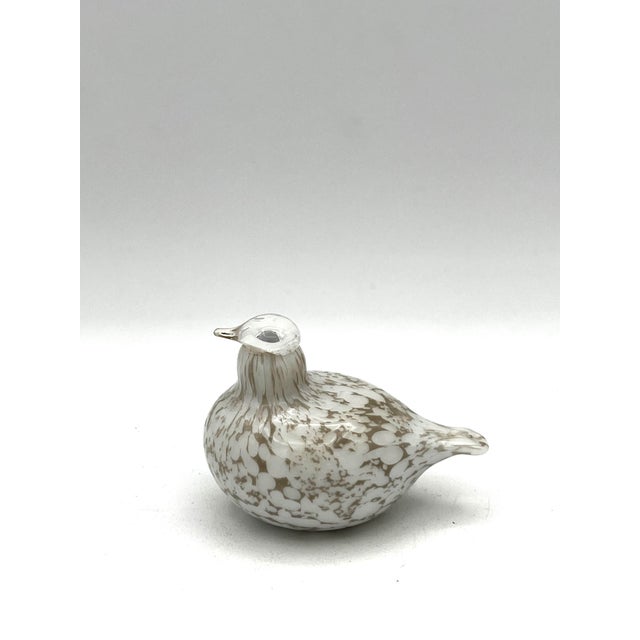 The "Oiva Toikka Art Glass Willow Grouse" sculpture, created by artist Oiva Toikka for the brand littala in Finland, is a...