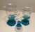 Clear, blue and green blown glass sugar and creamer. Unsigned several the larger pieces of art glass in this group are...