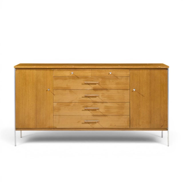 Paul McCobb for Calvin Linear Mid Century Walnut and Stainless Steel Credenza This credenza measures: 66 wide x 18 deep x...