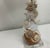 Stunning pair of decorative seashell table lamps featuring an exquisite arrangement of natural seashells in a...