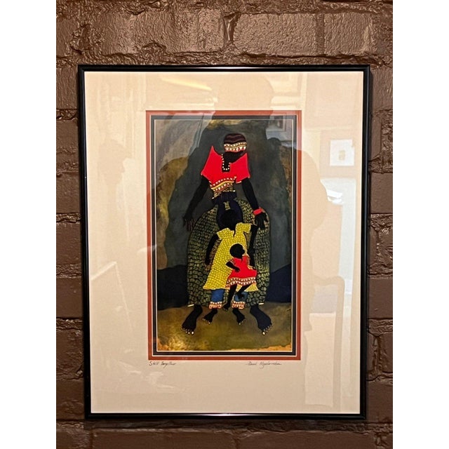 Signed fine art print titled "Still Together" by Ugandan artist Paul Nzalamba. Rendered in Nzalamba's signature batik-...