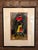 Signed fine art print titled "Still Together" by Ugandan artist Paul Nzalamba. Rendered in Nzalamba's signature batik-...