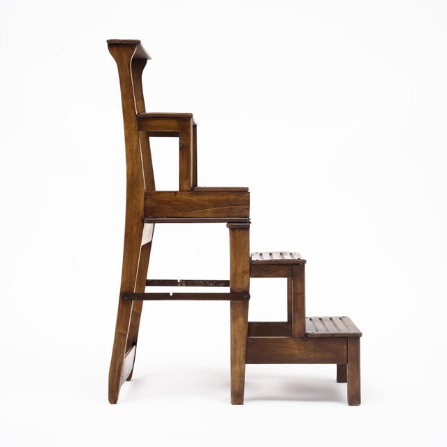 Set of stairs from France made of wood, foldable. When folded it turns into a chair. This set is in very nice antique...