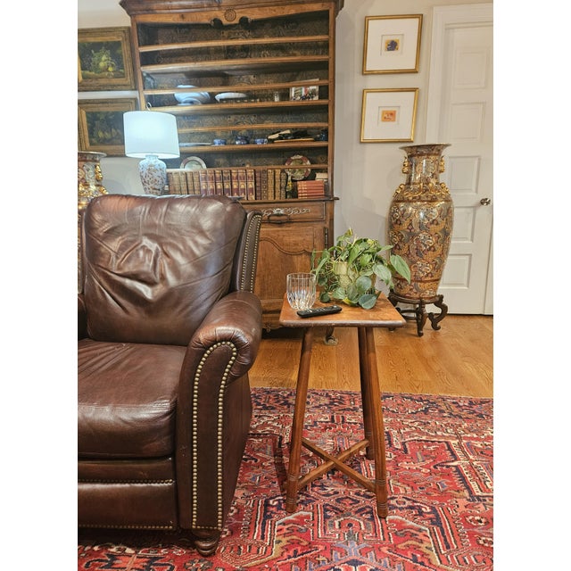 This antique Arts and Crafts–style wooden side table, also commonly referred to as a parlor stand or plant stand,...