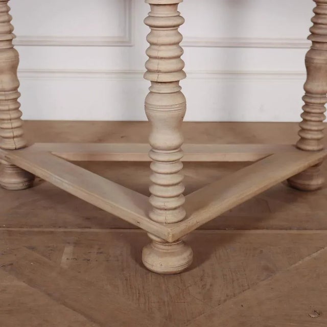 Early 19th C Dutch bleached carved walnut console table. 1880. This piece is designed in the style of the selected...