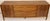 This is mid-century walnut credenza. The piece features sculpted drawers along with an inlayed diamond pattern on door...