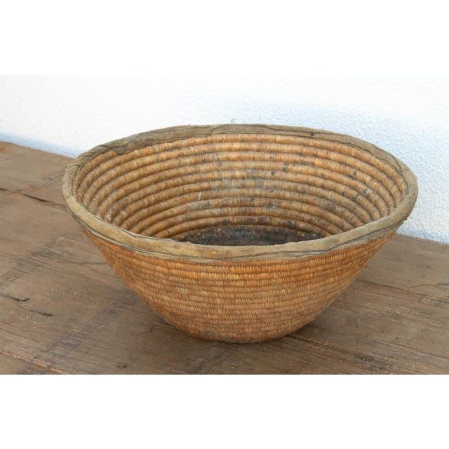 Tribal Antique Coiled Woven Harvest Basket For Sale - Image 3 of 9