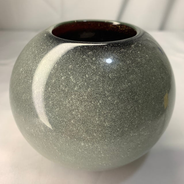 A striking and incredibly complex example of mid-century Italian studio glassmaking. This miniature hand-blown globe or...