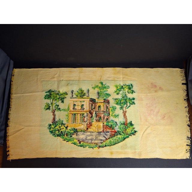 Offered for sale is a beautifully executed vintage mid-century cross-stitch needlepoint textile art piece depicting a...