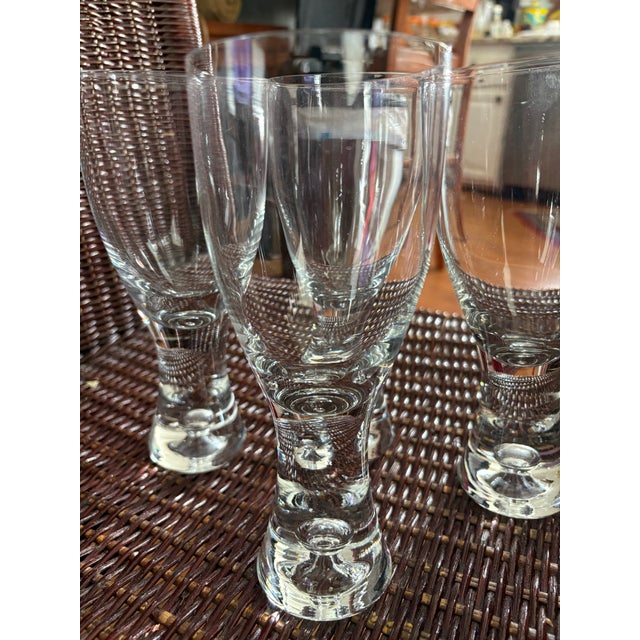 These glass are attributed to Iittala Tapio glassware, a classic mid-century modern design by the acclaimed Finnish...