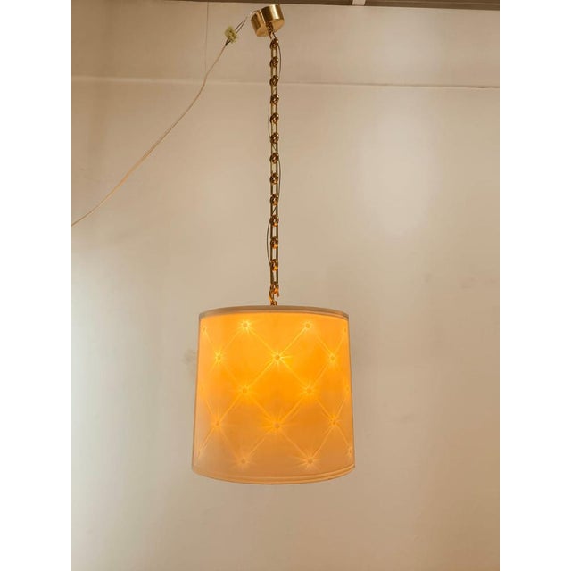 Gold Brass Pendant Lamp, in Flawless conditions. Designed 1970 to 1979 Up to 250V (Europe/UK Standard).The wiring of this...