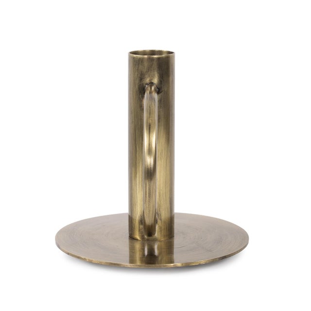 Illuminate your space with a touch of vintage-inspired elegance and modern flair using our Italo Candle Holder. This...