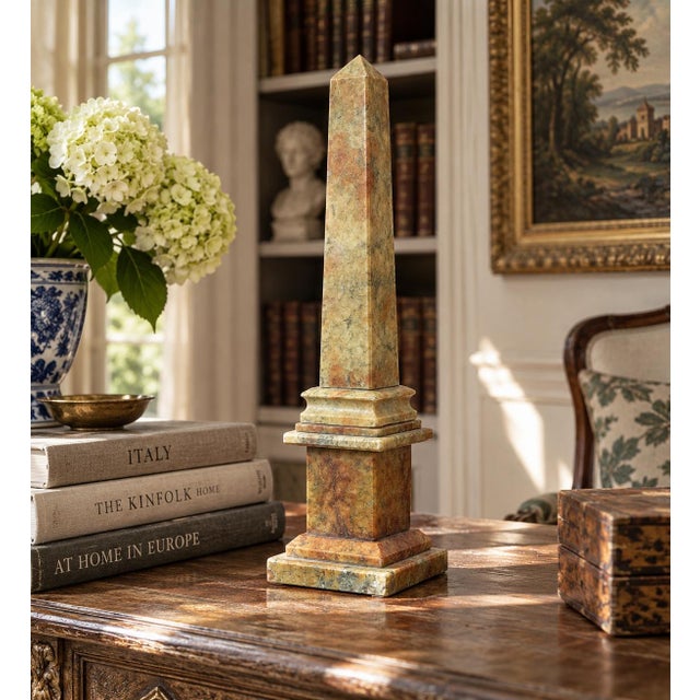 A beautifully proportioned antique Italian marble obelisk in richly veined shades of green and brown. The sculptural...