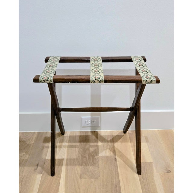 Add a touch of classic charm to your guest room or entryway with this vintage wooden folding luggage rack. Attractive...